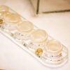 Set of 2 Spice Holder Bowls, Camil Glass Spice Tray With 5 Tiny Bowls by Anna Vasily on a table.