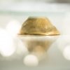 Close up of Polished Brass Pedestal Cake Stand Harmo by Anna Vasily